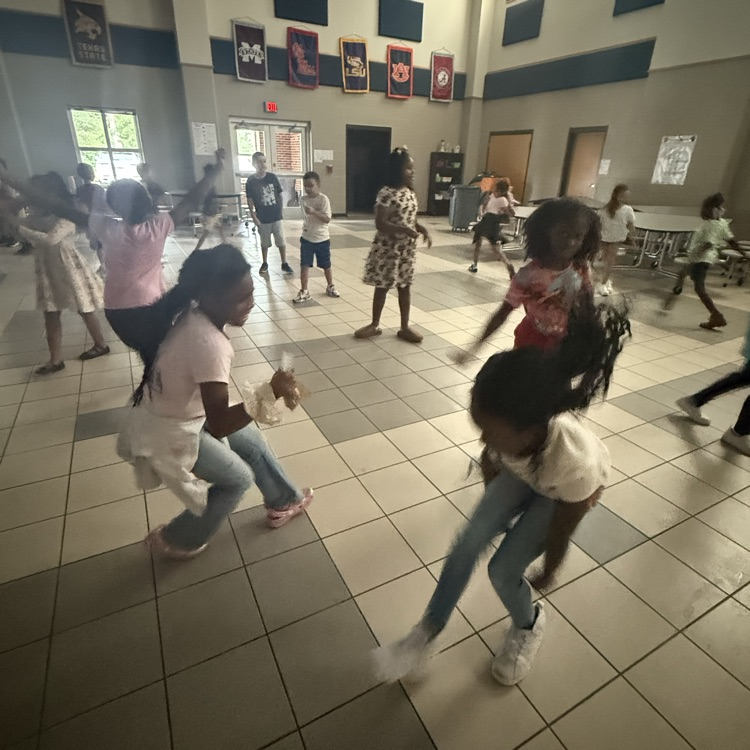 Students dancing at a dance party