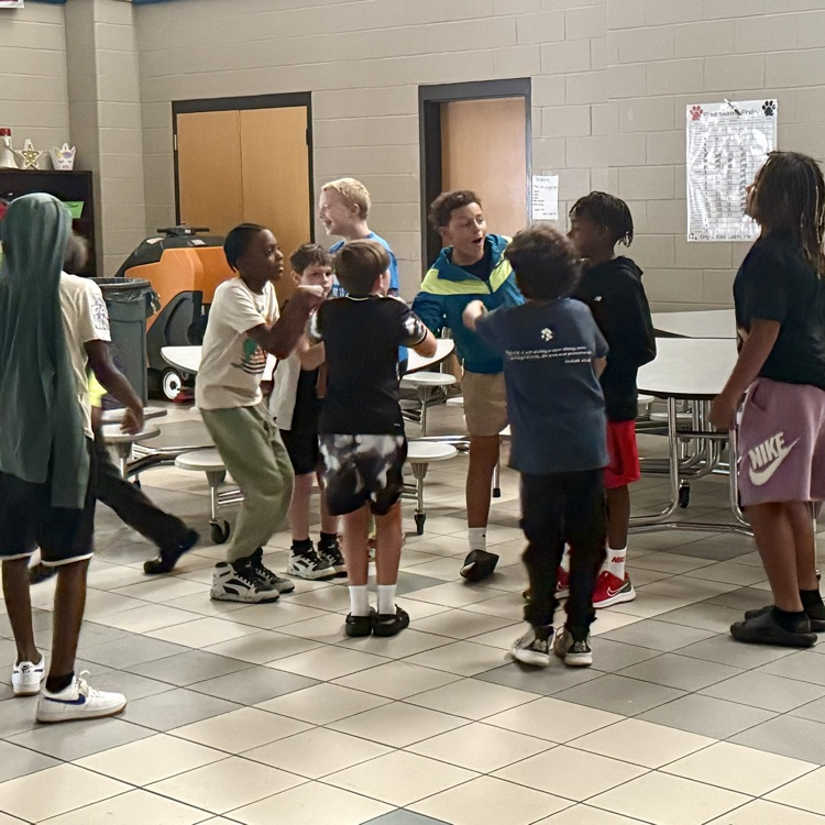Fifth graders dancing at a dance party