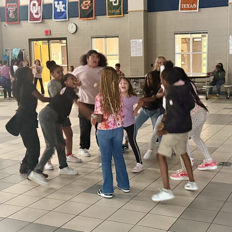 Fourth grade students dancing at a dance party