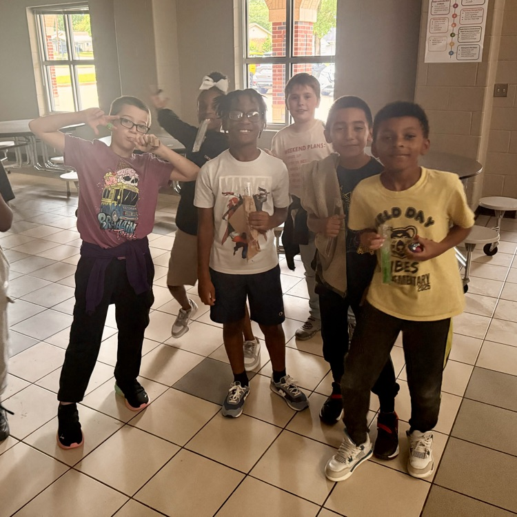 Students eating popsicles at a dance party