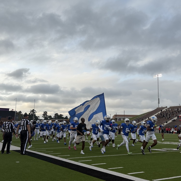 players running onto field
