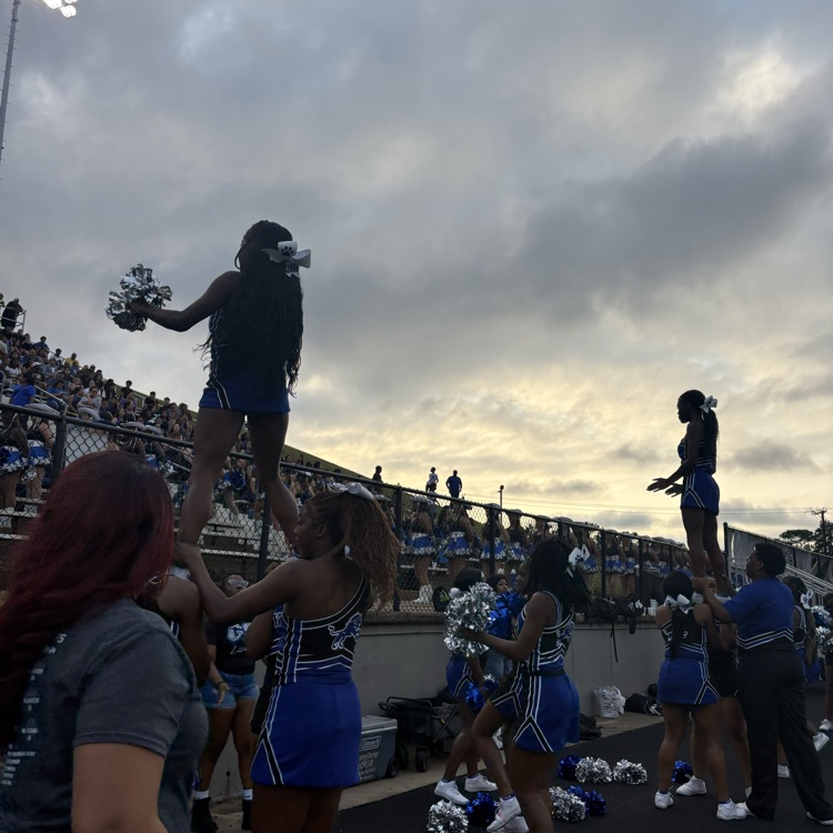 cheerleaders doing a cheer