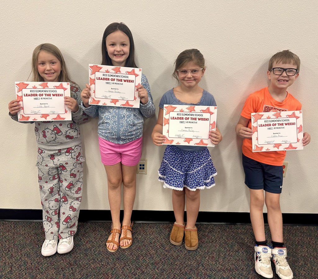 3 girls and 1 boy holding certificates