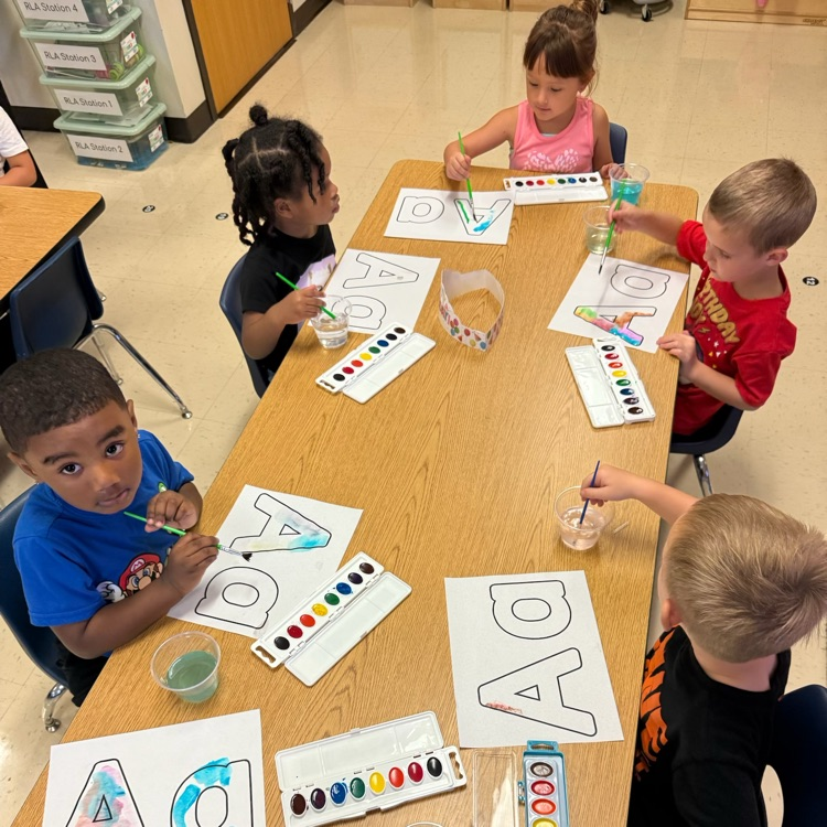 pre-K students, watercolor, painting the letter a