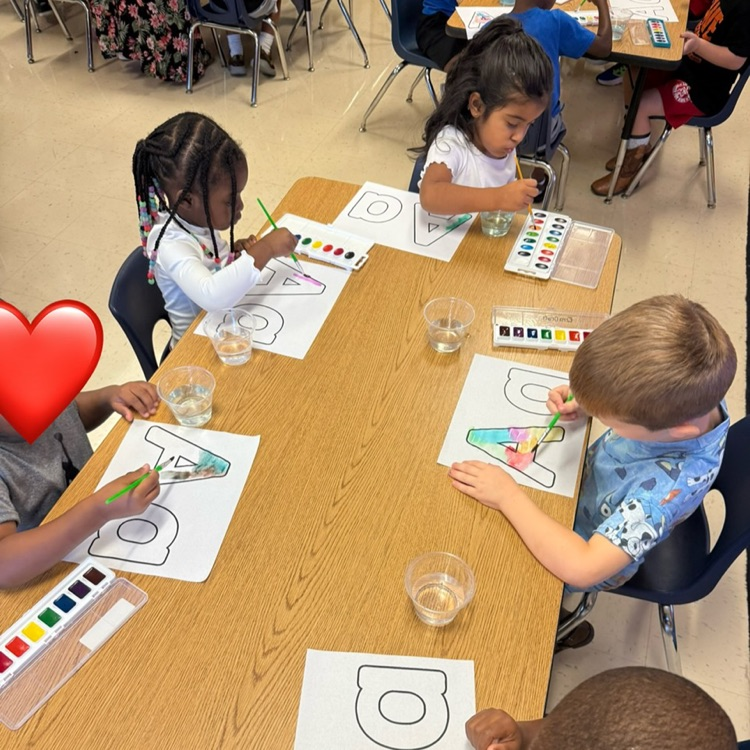 Pre-K students, watercolor, painting the letter a