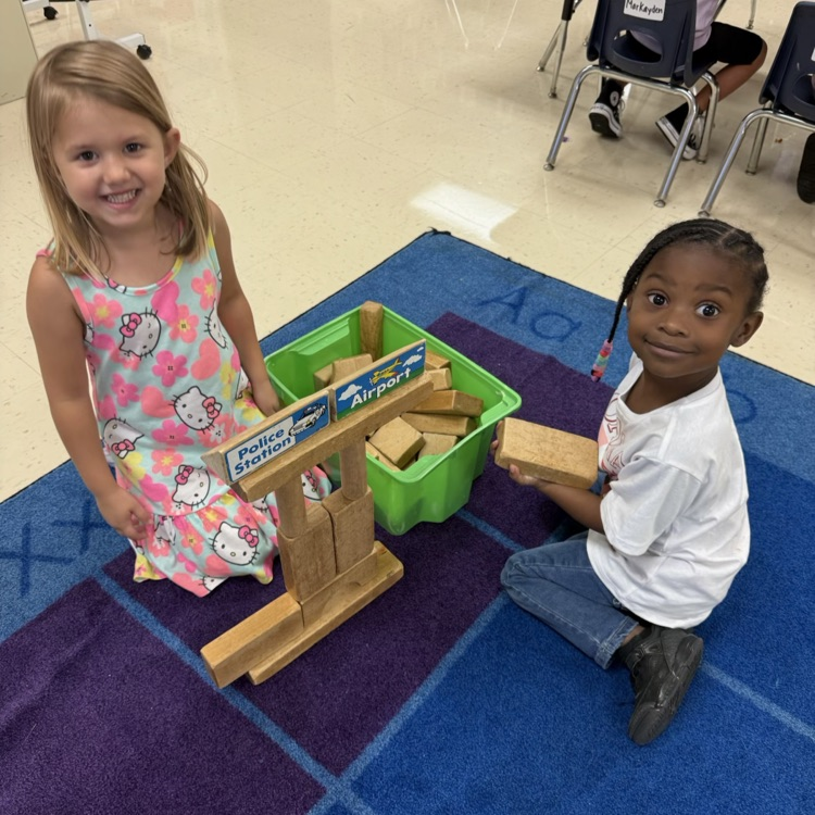 Pre-K students building with blocks