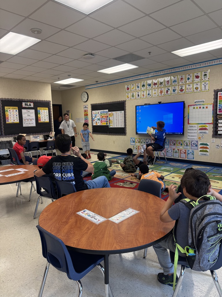 Tyler High Lions reads to Orr Elementary Students