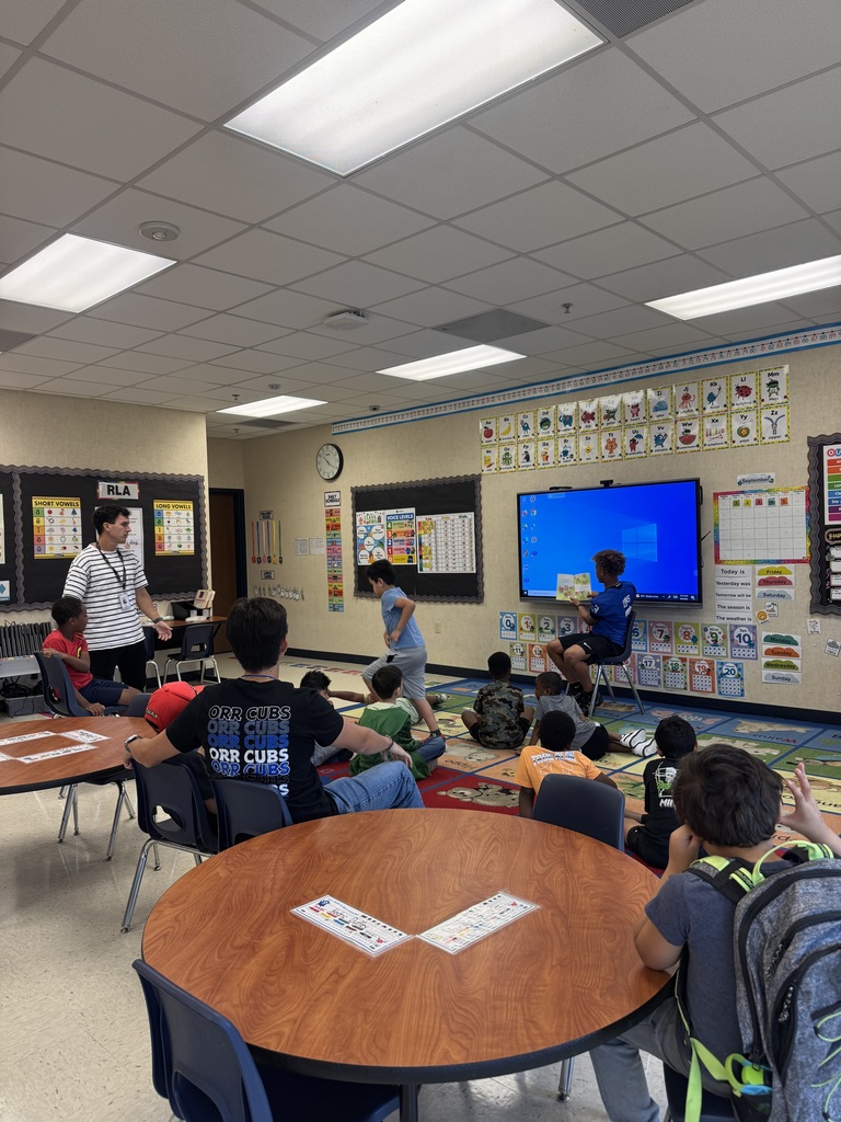 Tyler High Lions reads to Orr Elementary Students