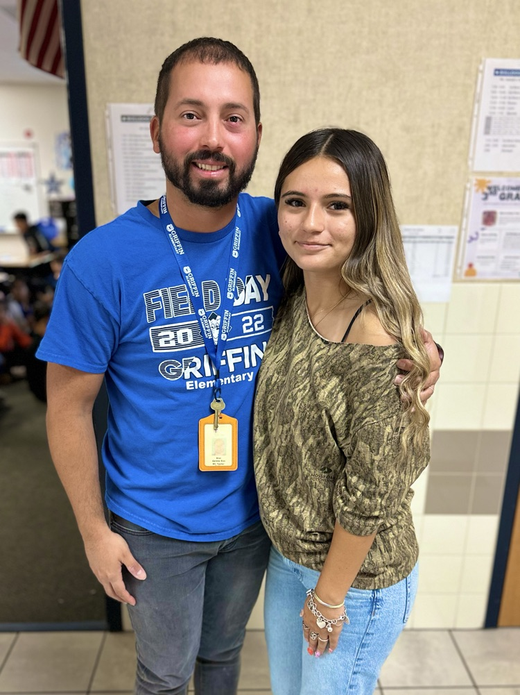 teacher and former student