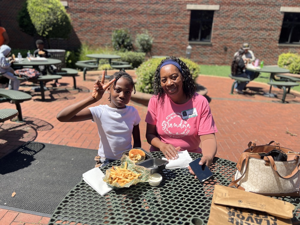 woman smiling with granddaughter