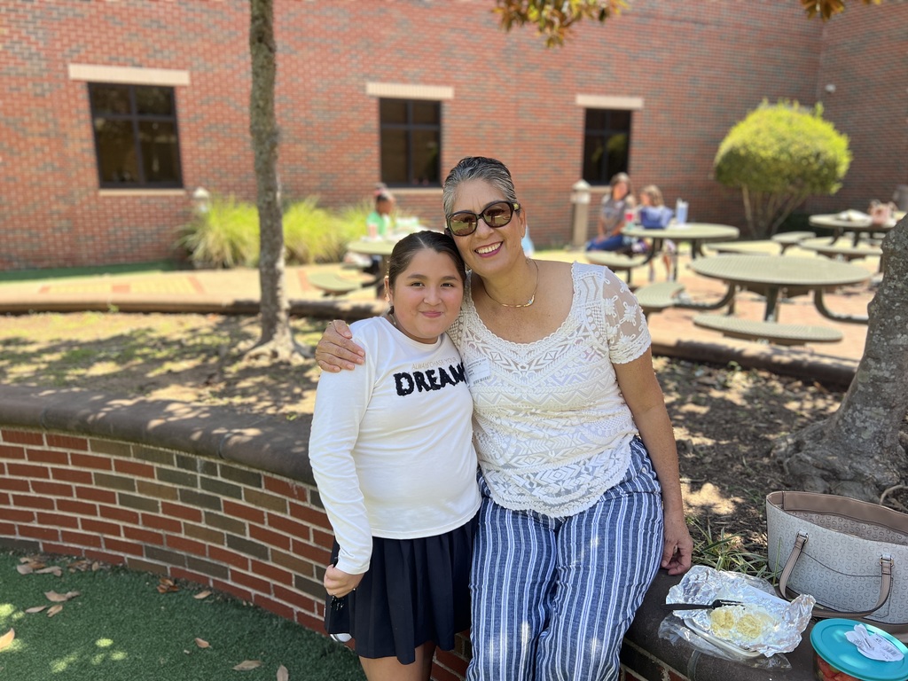 woman smiling with granddaughter
