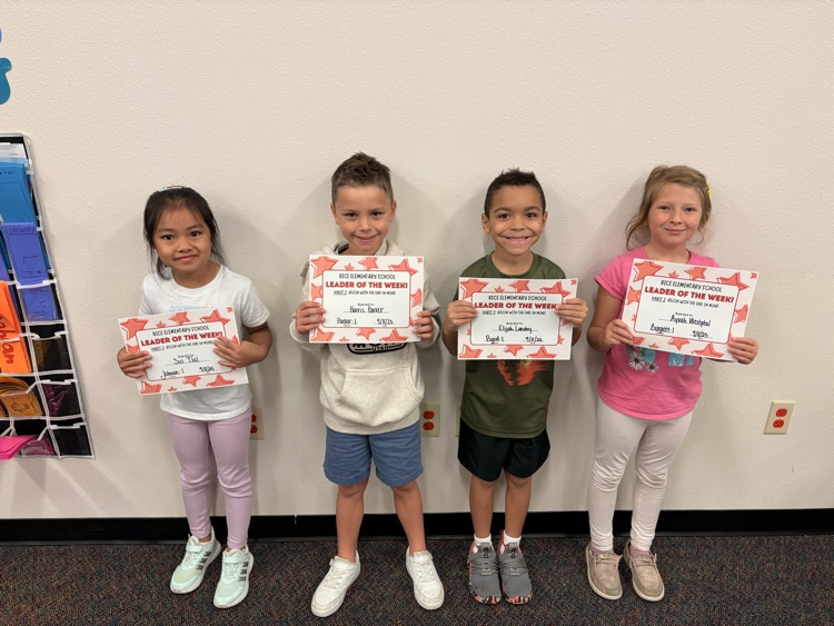 students holding certificates