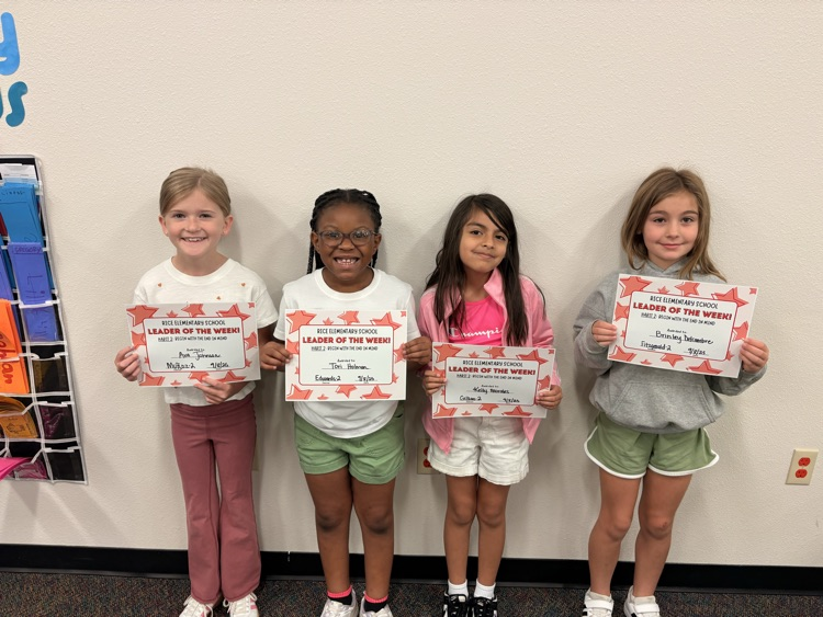 students holding certificates