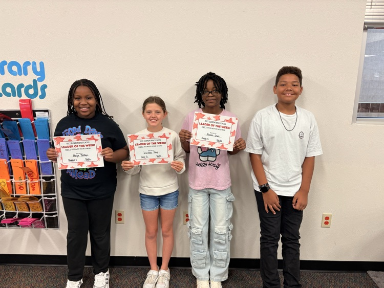 students holding certificates