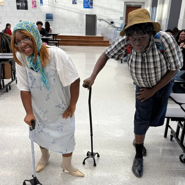 two students dressed as senior citizen