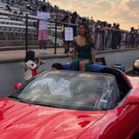 girl in red car