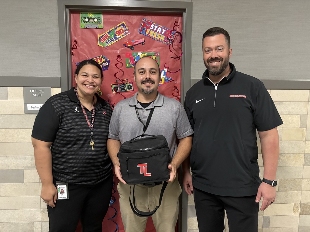 Tyler Legacy's Kala Morrow, Geoff Sherman, and IT technician Alfonso Malacara posing for IT professionals day