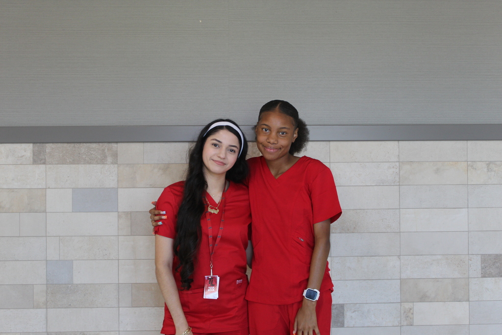 Tyler Legacy staff and students matching for twin day for HoCo spirit week