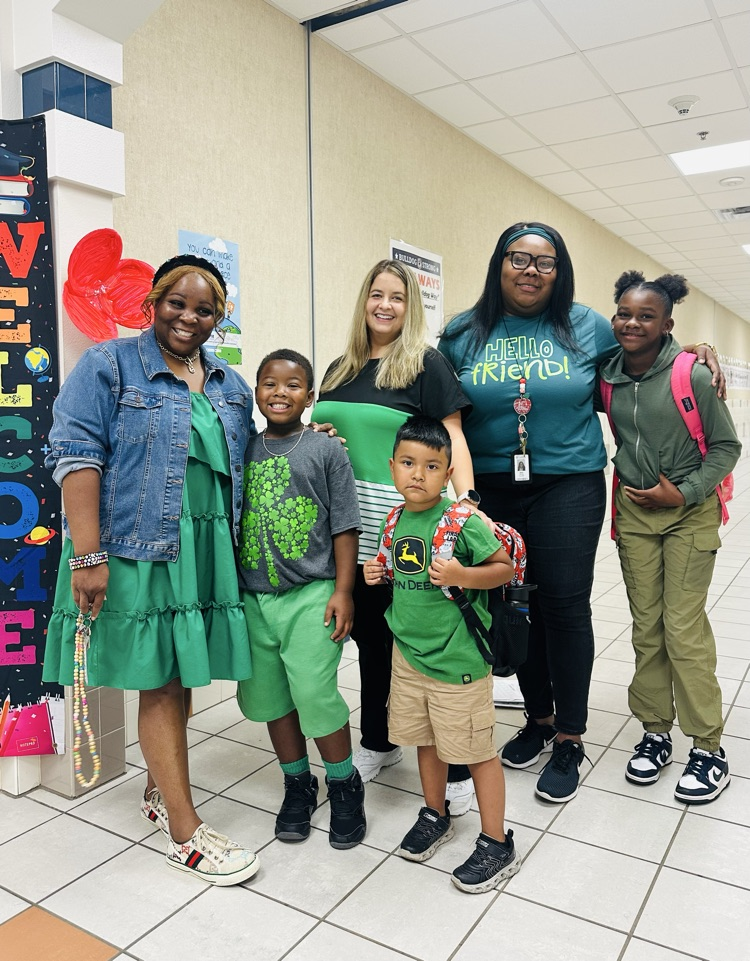 staff and students wearing green