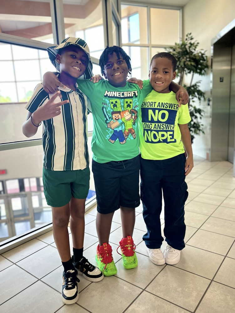 staff and students wearing green