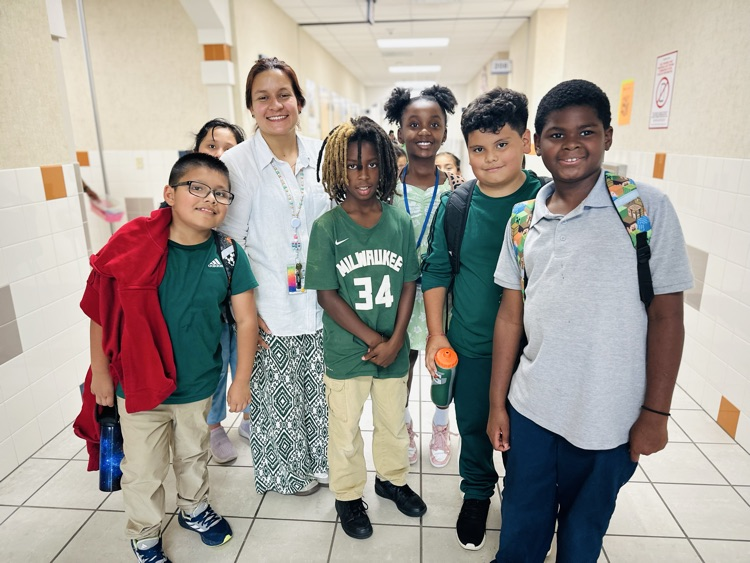 staff and students wearing green