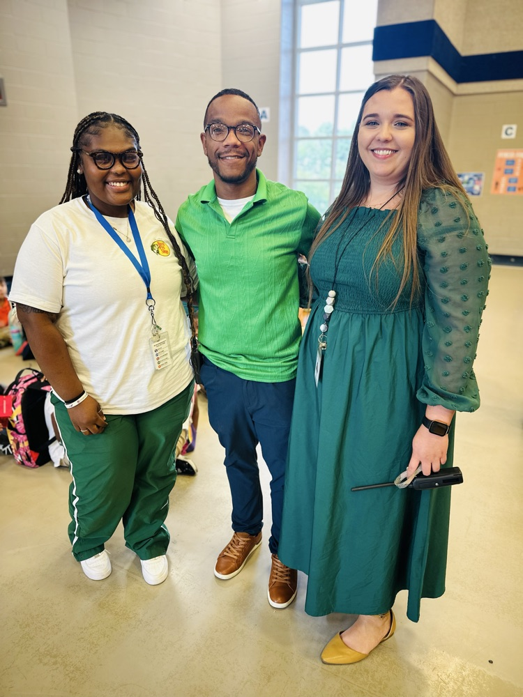 staff and students wearing green