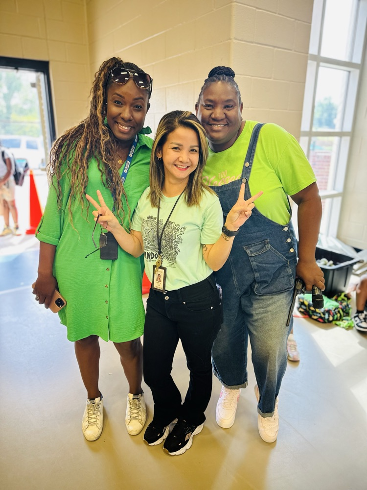 staff and students wearing green