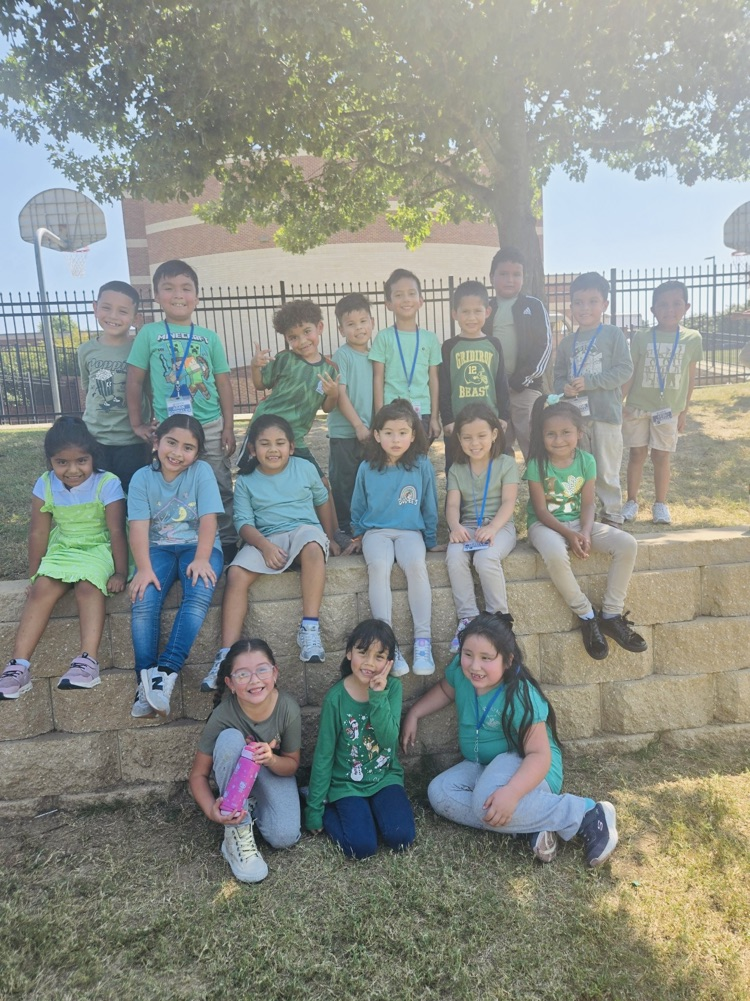 staff and students wearing green