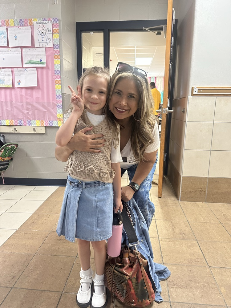 child with grand friends after shopping at the book fair