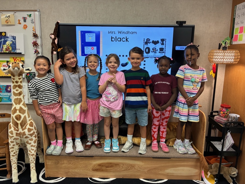 Students wearing patterned shirts. 