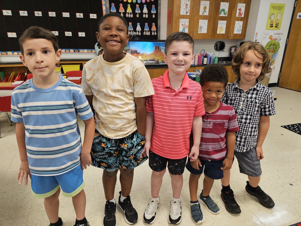 Students wearing patterned shirts. 