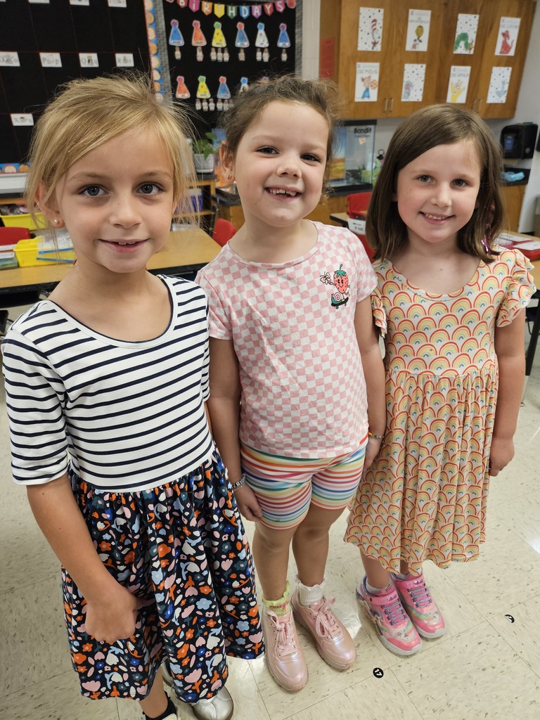 Students wearing patterned shirts. 