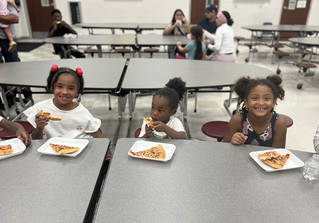 girls eating pizza