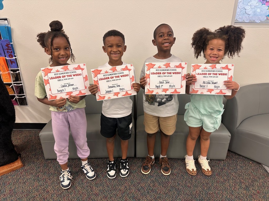students holding certificates