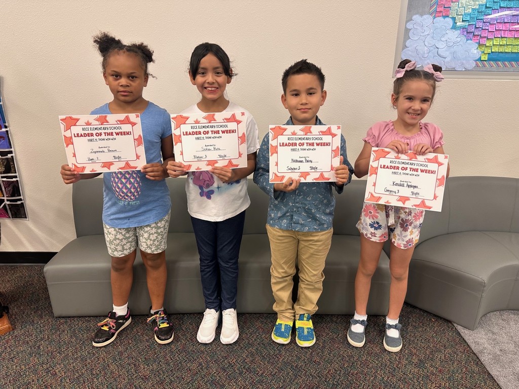 students holding certificates