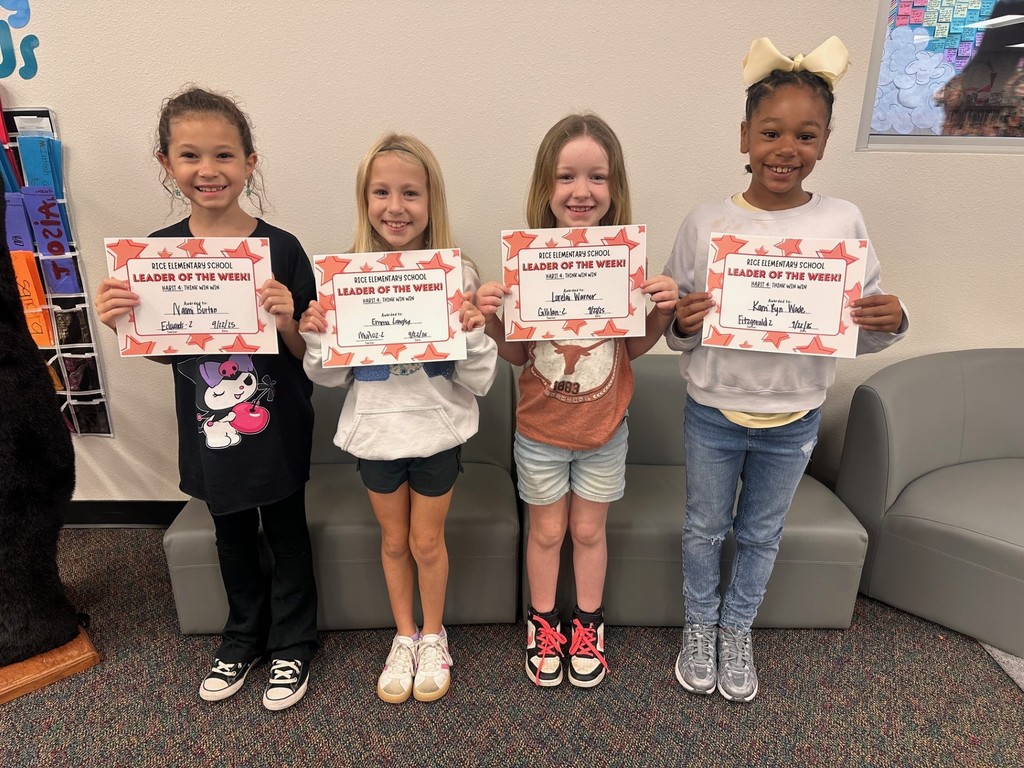 students holding certificates
