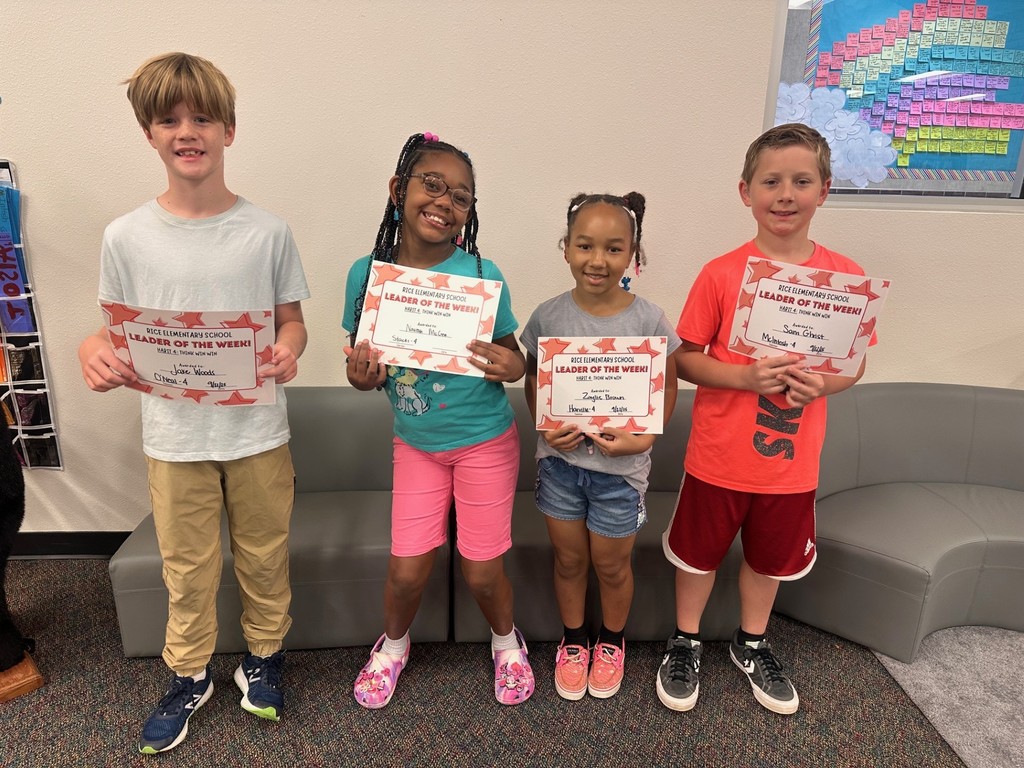 students holding certificates