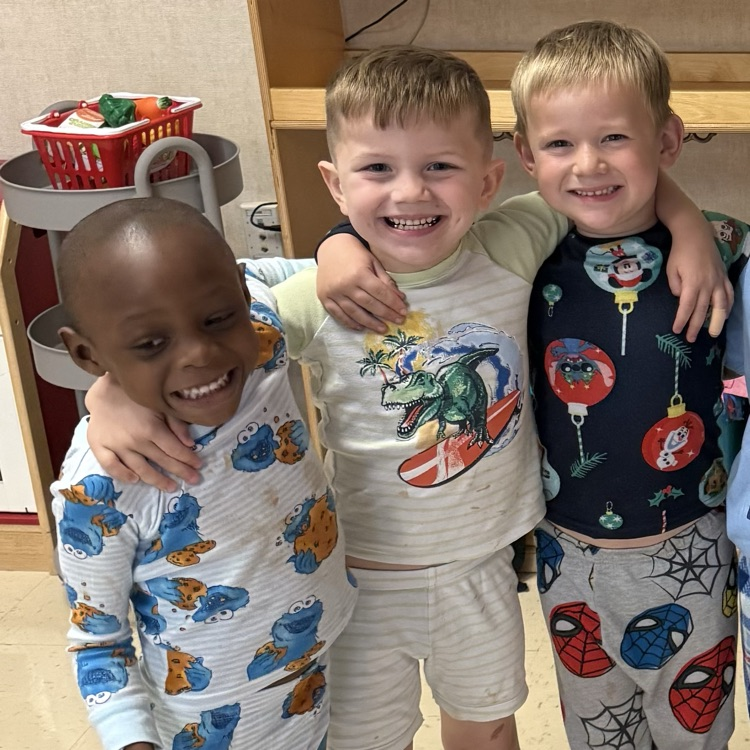 Student dressing up in pajamas and hugging