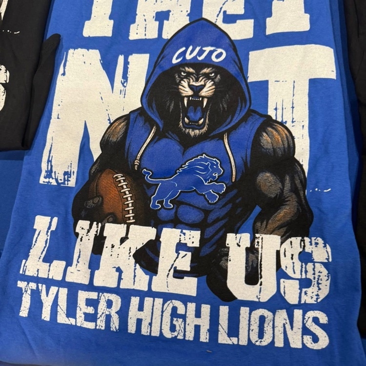shirt with lion on it 