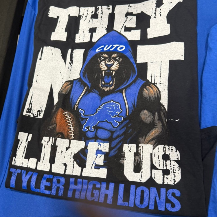 shirt with lion on it