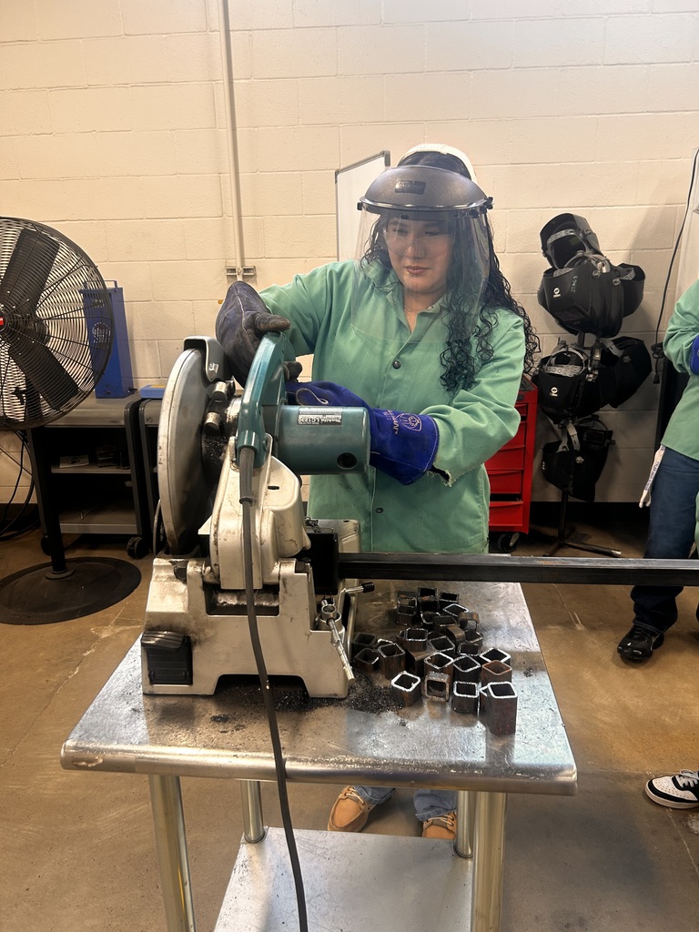 student using a saw