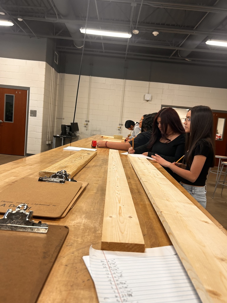 students taking measurements