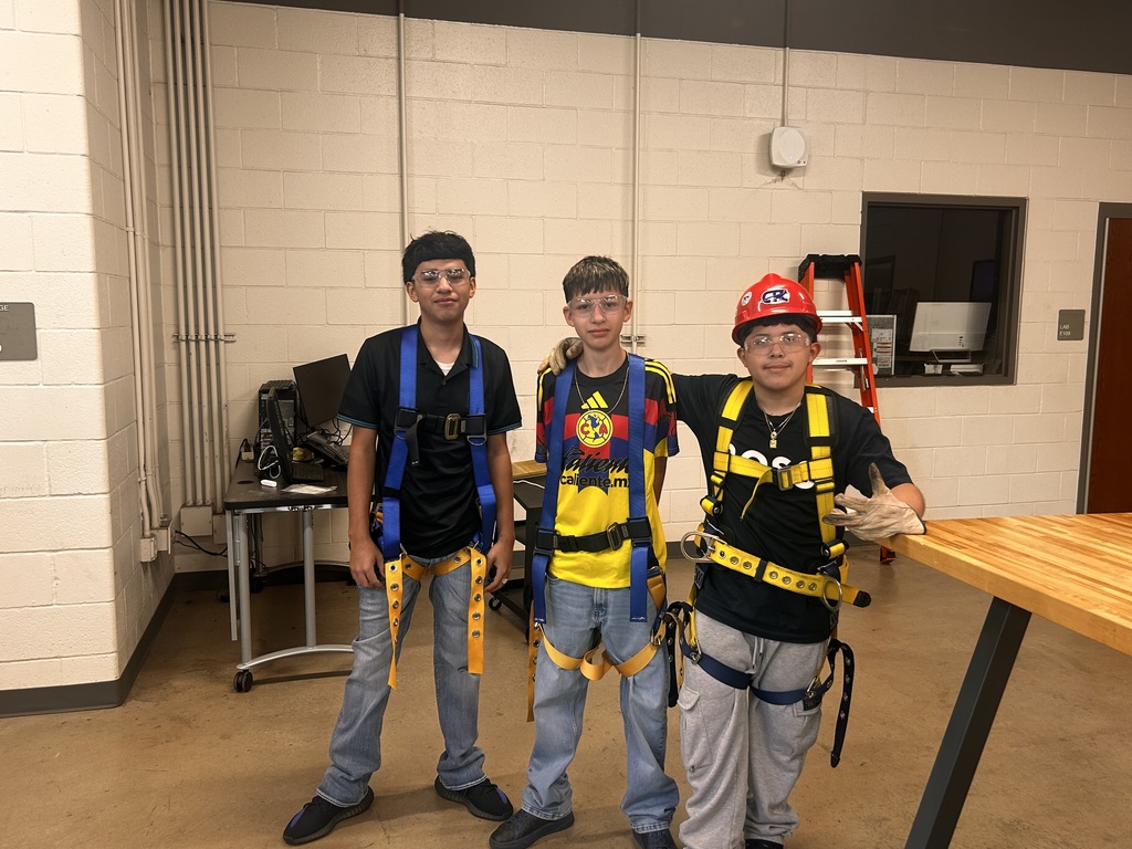 students wearing safety equipment