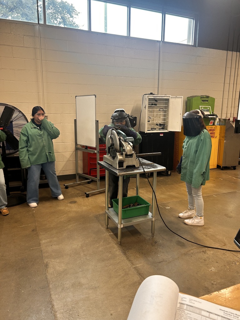 students using a saw