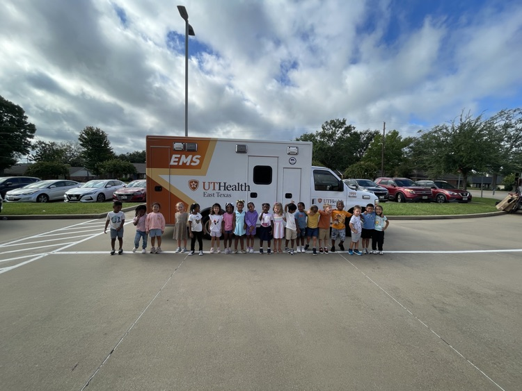 Children learning about ambulances.