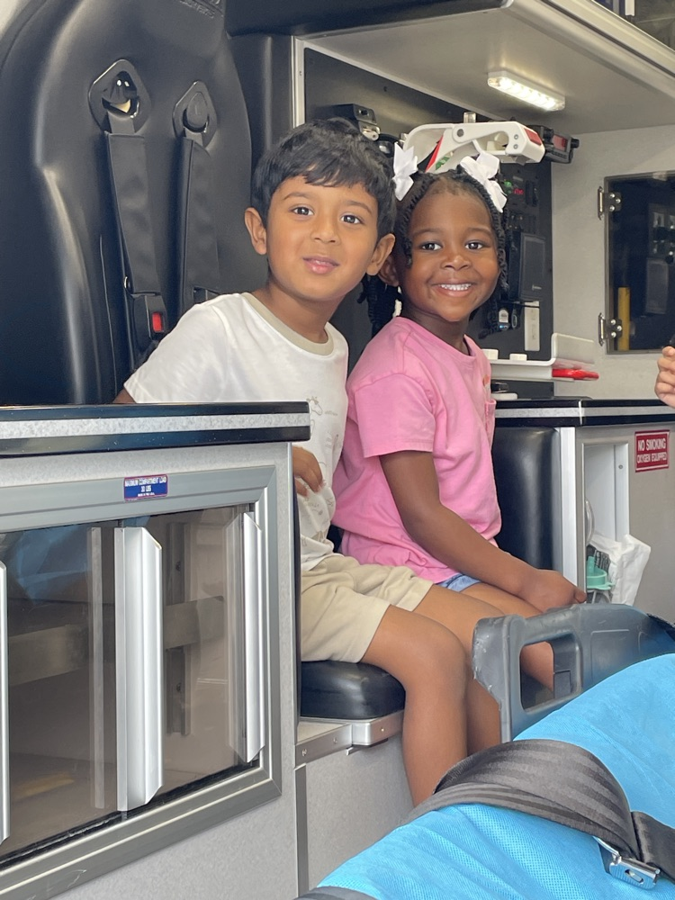 Children learning about ambulances.