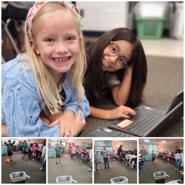 students working together as a class on word problems. Once correct the students get to shoot the basketball in the trashcan as a game!