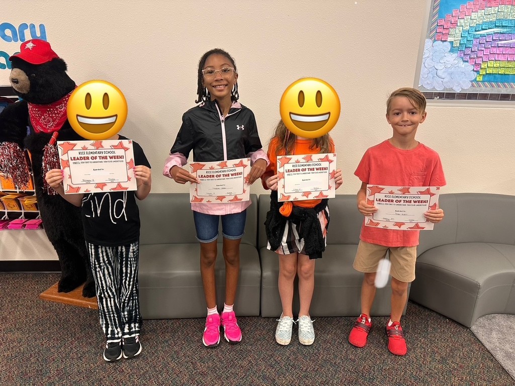 students holding certificates