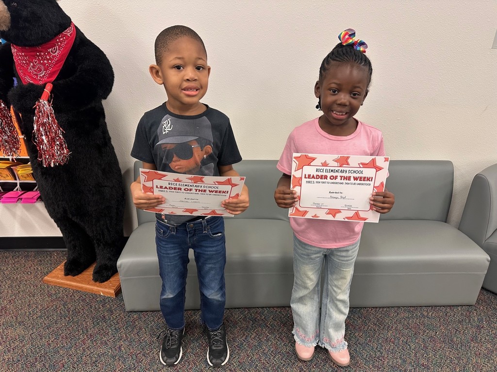 students holding certificates