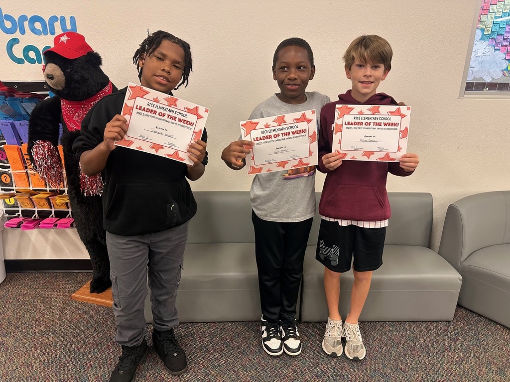 students holding certificates